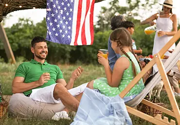 Happy family at picnic on labor day