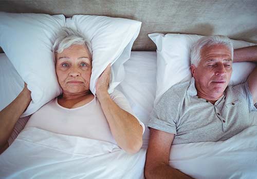 Snoring may be a sign of obstructive sleep apnea.