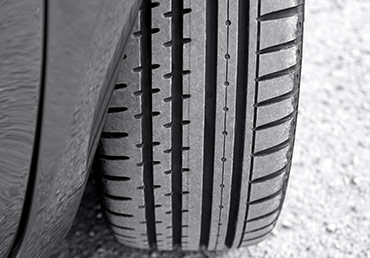 A tire with safe tread depth is seen.