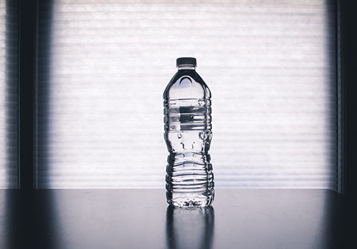 A water bottle is photographed.