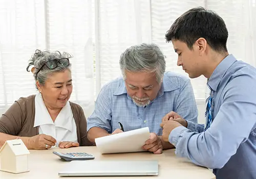 Older couple deciding on their life insurance coverage after term life insurance expired.