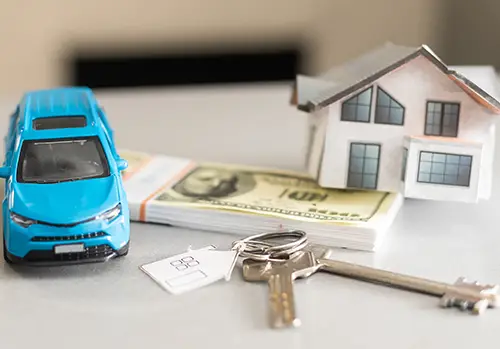 financial planning saving money small toy car with house, infinite banking concept finance growth and property on gray background table