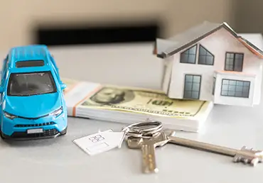 financial planning saving money small toy car with house, infinite banking concept finance growth and property on gray background table