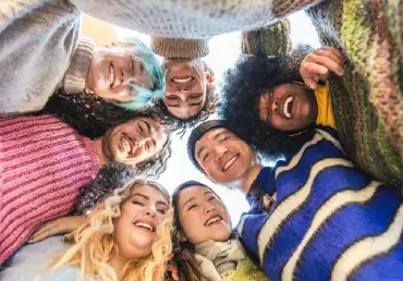 Life Insurance for Young Adults young adult group smiling circle multiple ethnicities colorful clothing thumbnail image