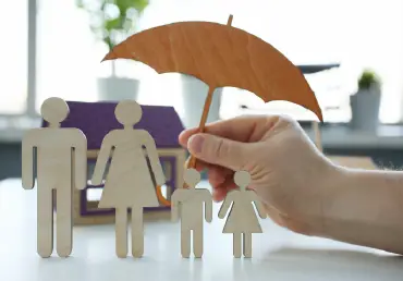 family wooden and umbrella providing coverage and protection